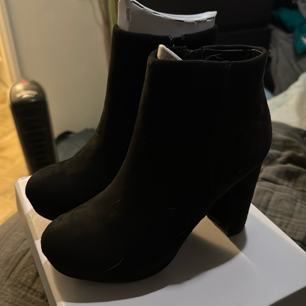 Black high heeled ankle booties new in box!